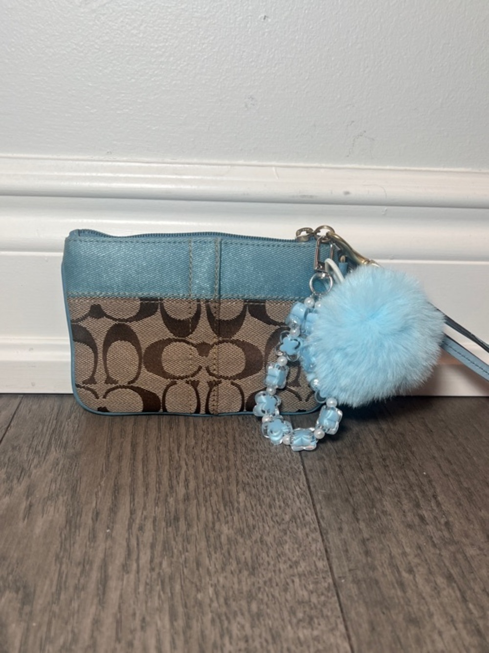 Coach Brown Signature Canvas Wristlet with Light Blue Trim and Pom